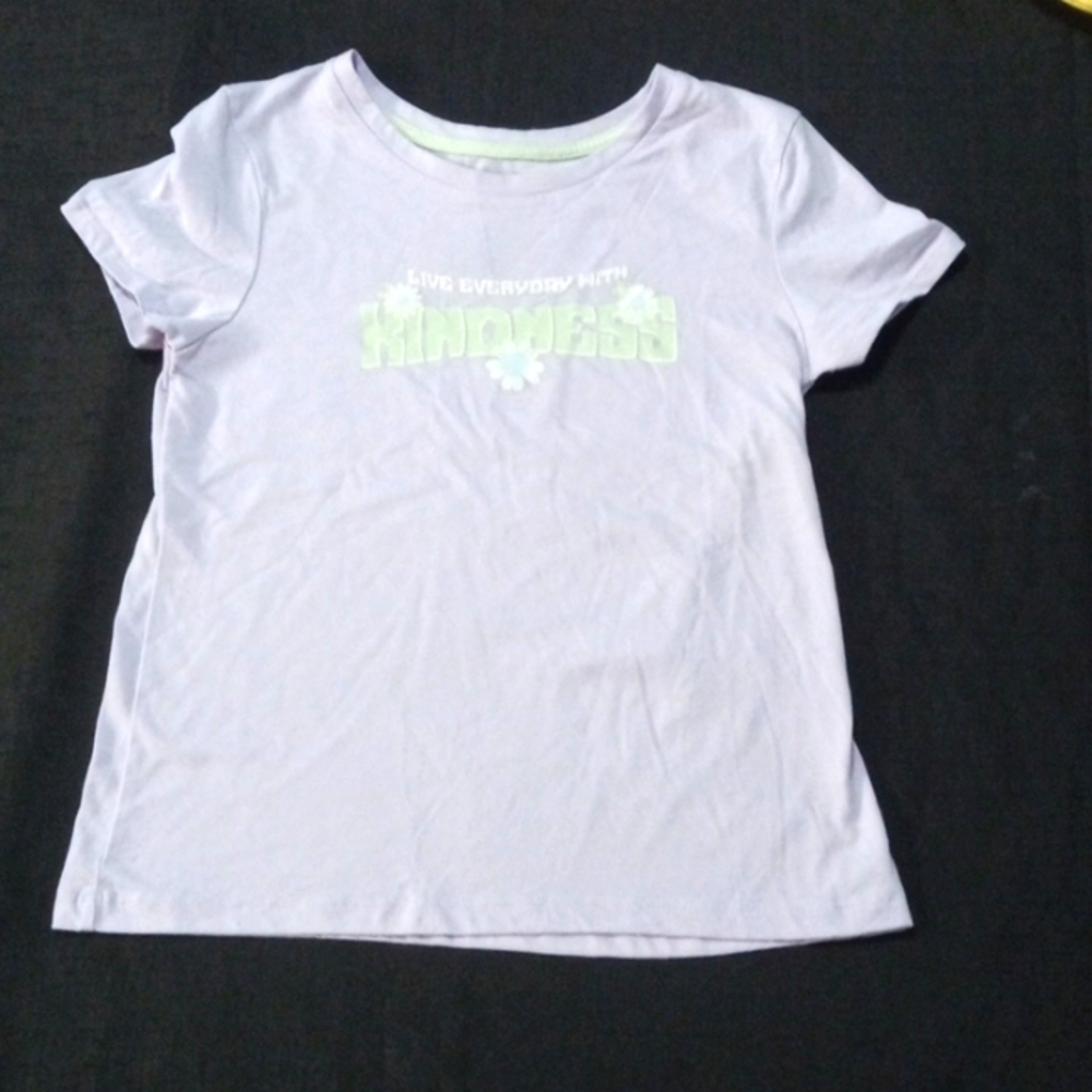 All the shirts have purple, green and light blue on each one. You get 3 shirts.
